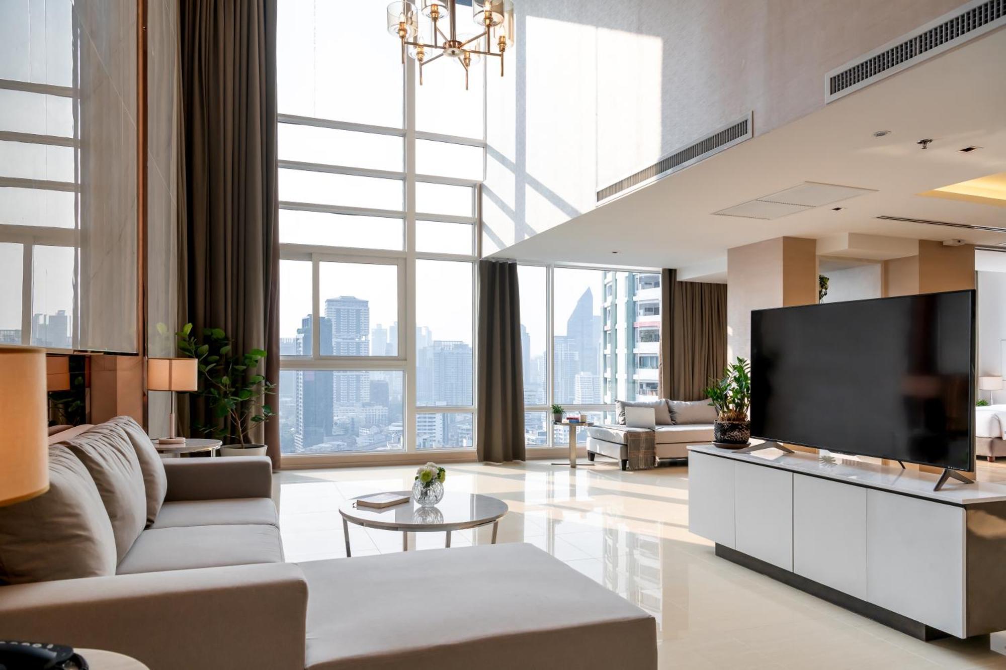 Jasmine 59 Hotel Bangkok Luaran gambar A living room in a luxury apartment